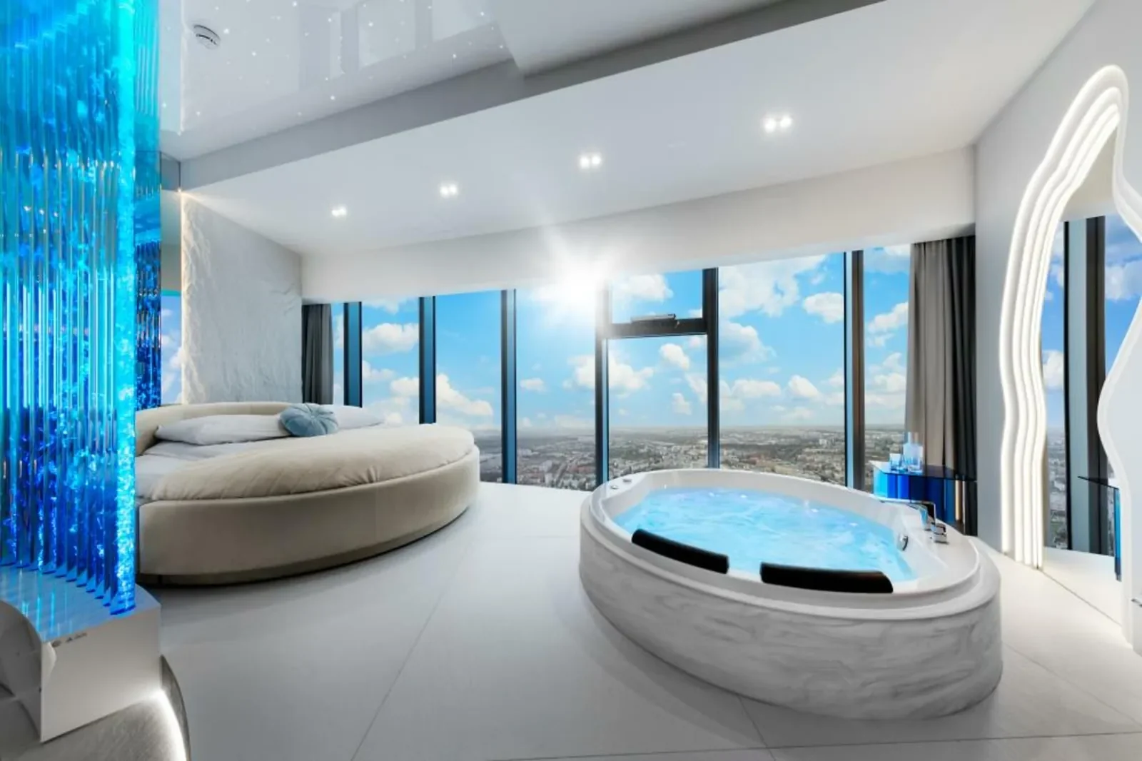 Apartament Santorini: okrągłe łóżko, ściana wody i jacuzzi przy oknie